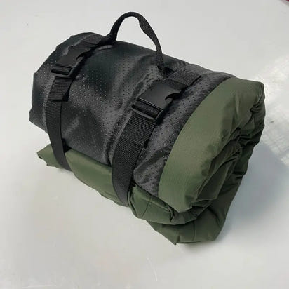 Rolled-up pet outdoor portable waterproof mat with straps for outdoor adventures