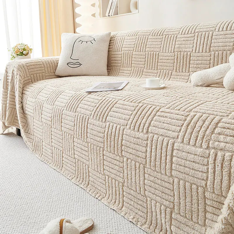 Beige textured sofa cover for plush modern simple sofa in a cozy living space