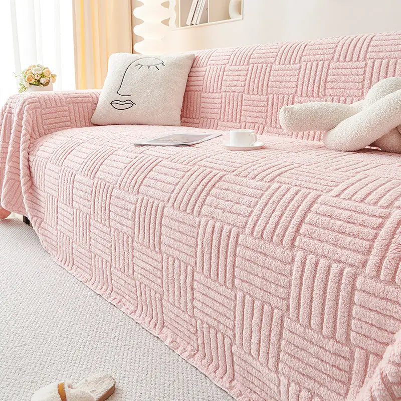 Pink textured sofa cover for plush modern simple sofa in a stylish living space