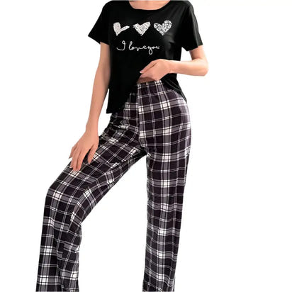 Black pajama set with plaid pants.