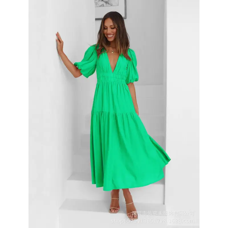 Woman in a green maxi dress.