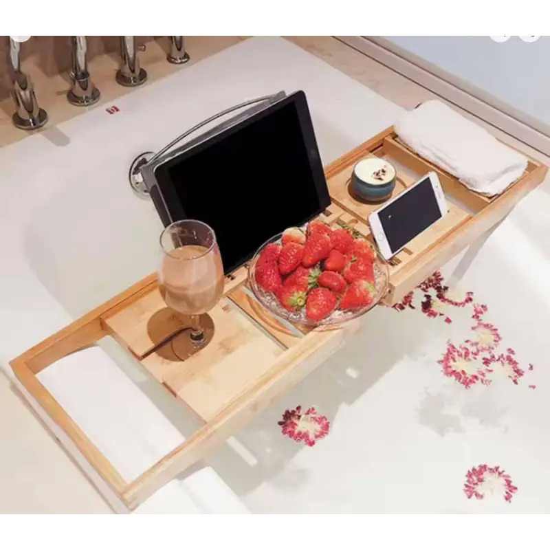 Bathtub tray with accessories.