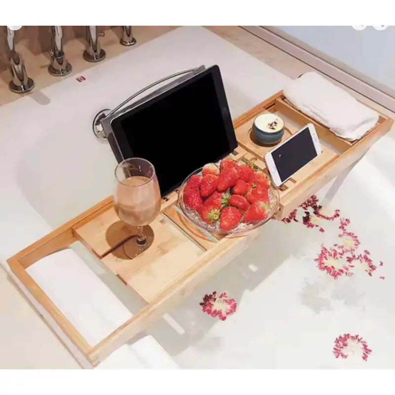 Bathtub tray with accessories.