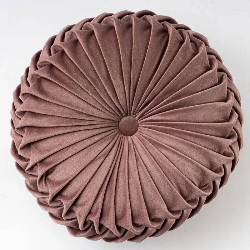 Round pleated mauve velvet cushion with playful pumpkin pillow design and unique pumpkin shape