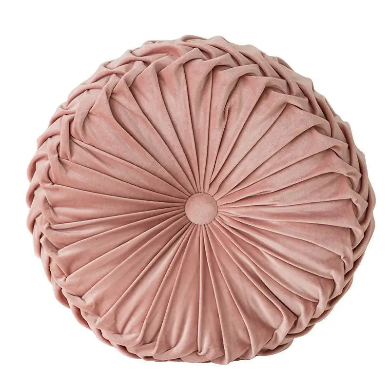 Pink velvet pillow in playful pumpkin shape, perfect as a unique pumpkin pillow decor