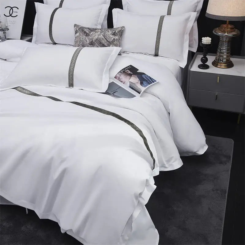 White bedding with dark trim.