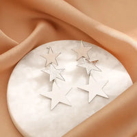 Silver star drop earrings showcasing retro charm and statement metal long drop earrings