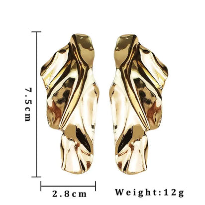 Gold-colored abstract earrings showcasing retro charm, perfect statement metal long drop earrings