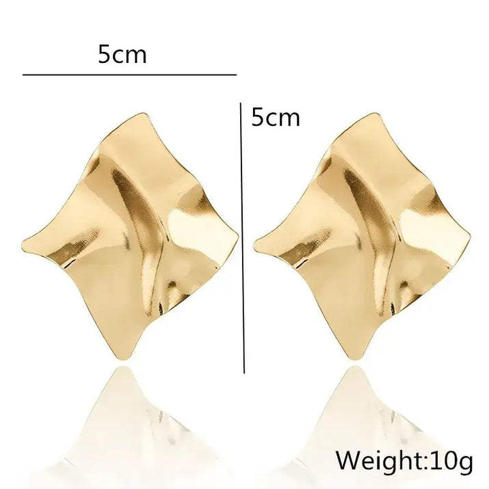 Pair of gold square crinkled earrings showcasing retro charm in statement metal long drop earrings