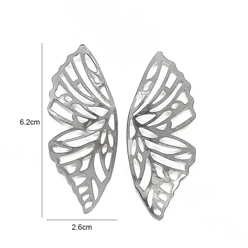 Silver butterfly wing earrings showcasing retro charm in statement metal long drop earrings