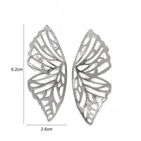 Silver butterfly wing earrings showcasing retro charm in statement metal long drop earrings