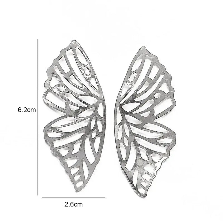 Silver butterfly wing earrings showcasing retro charm in statement metal long drop earrings