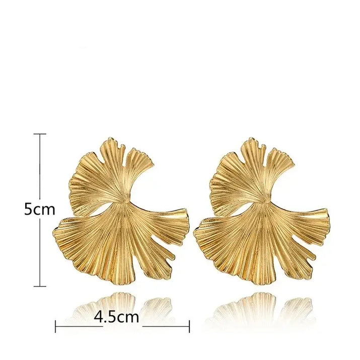 Gold Ginkgo Leaf Earrings showcased as Retro Statement Metal Long Drop Earrings with retro charm