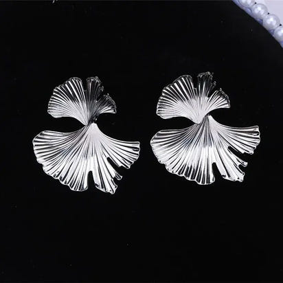 Silver ginkgo leaf earrings in Retro Statement Metal Long Drop Earrings with retro charm
