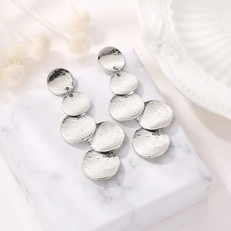 Silver hammered disc earrings featuring retro charm, perfect statement metal long drop jewelry