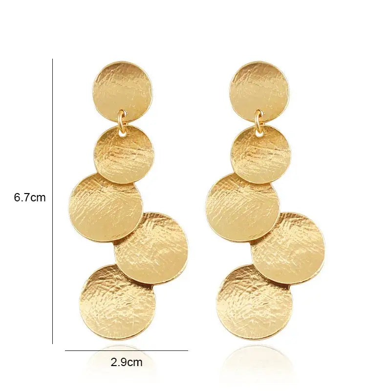 Gold disc drop earrings featuring retro charm in stylish statement metal long drop earrings