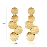 Gold disc drop earrings featuring retro charm in stylish statement metal long drop earrings