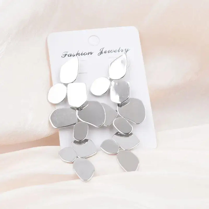 Silver geometric dangle earrings featuring retro charm and statement metal long drop design