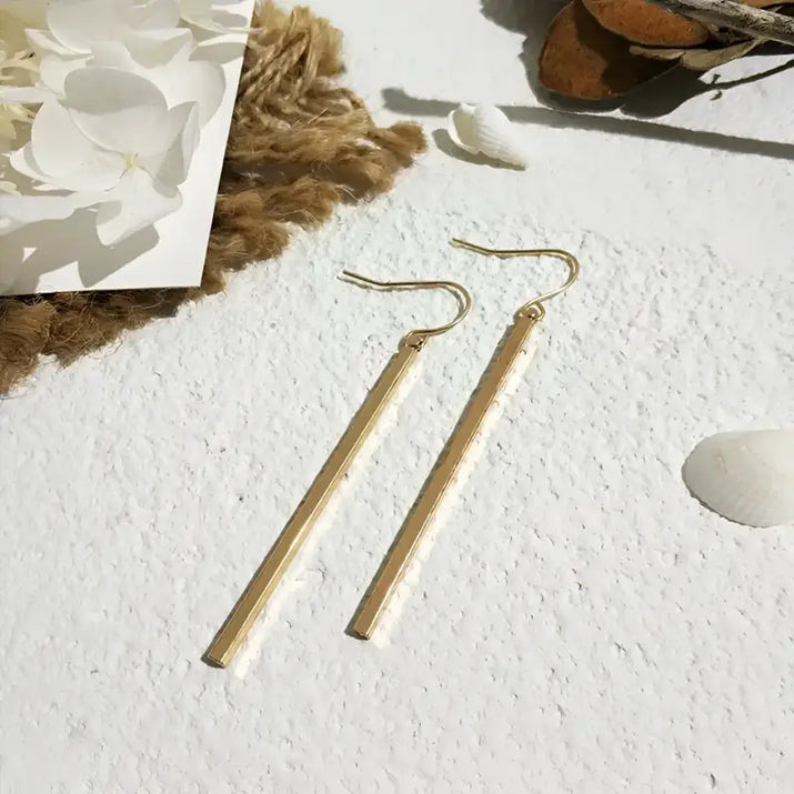Gold bar earrings featuring retro charm as statement metal long drop earrings