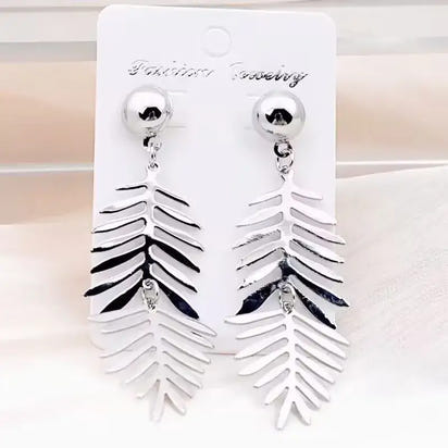 Silver leaf-shaped long drop earrings with retro charm, perfect for statement metal long jewelry