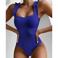 Blue ruffled one-piece swimsuit.