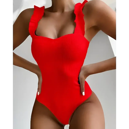 Red ruffled one-piece swimsuit.