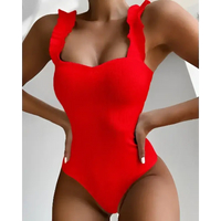 Red ruffled one-piece swimsuit.