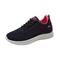 Black and pink athletic running sneakers for women perfect for jogging and workouts