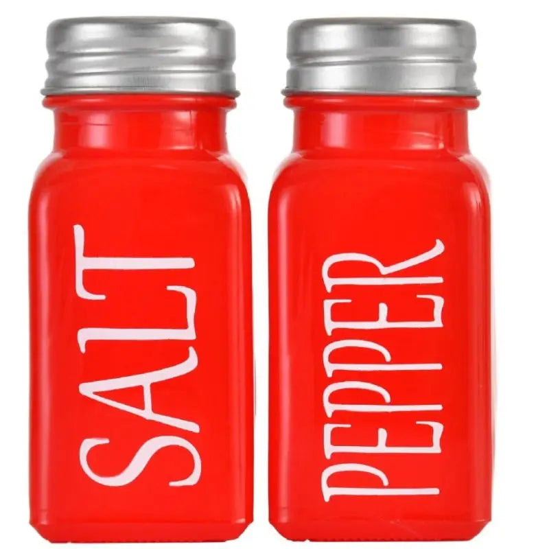 Red salt and pepper shakers from a playful set of pepper shakers and a pepper shaker