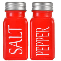 Red salt and pepper shakers from a playful set of pepper shakers and a pepper shaker