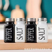 Playful set of salt and pepper shakers, including a stylish pepper shaker for your table
