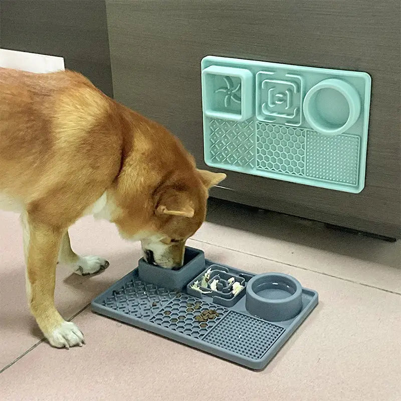 Dog eating from a silicone cat dog lick plate to promote slow feeding and mental stimulation