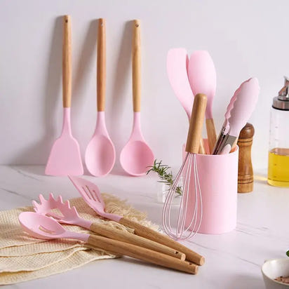 Pink silicone kitchen utensil set.