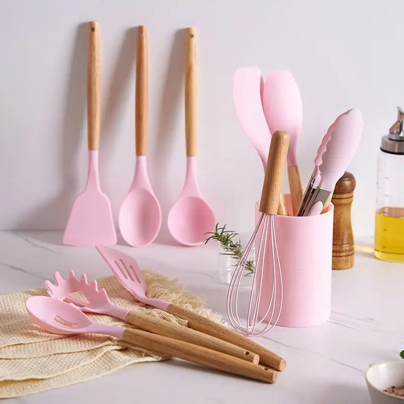Pink silicone kitchen utensil set.