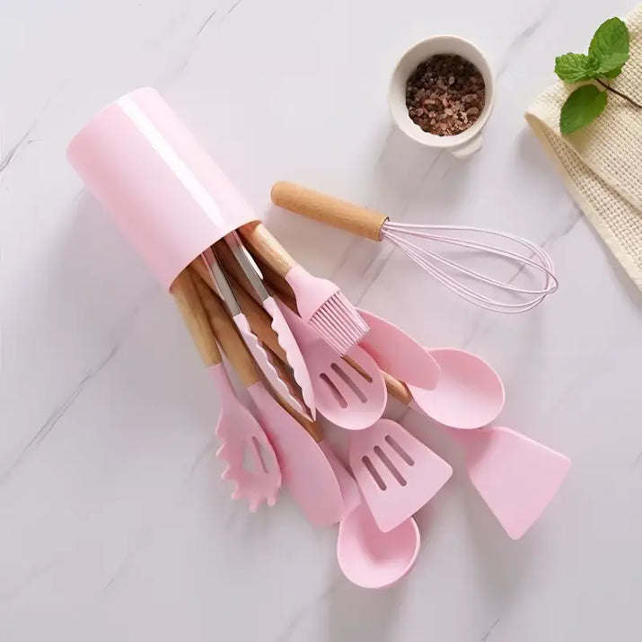 Pink silicone kitchen utensil set.