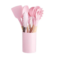 Pink silicone kitchen utensil set.