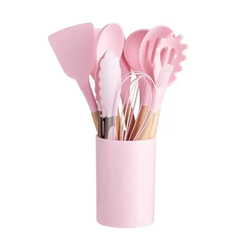 Pink silicone kitchen utensil set.
