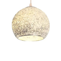 Textured glass pendant light.