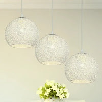 Three spherical pendant lights.