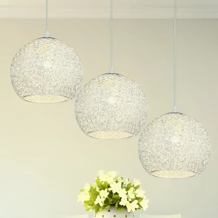 Three spherical pendant lights.
