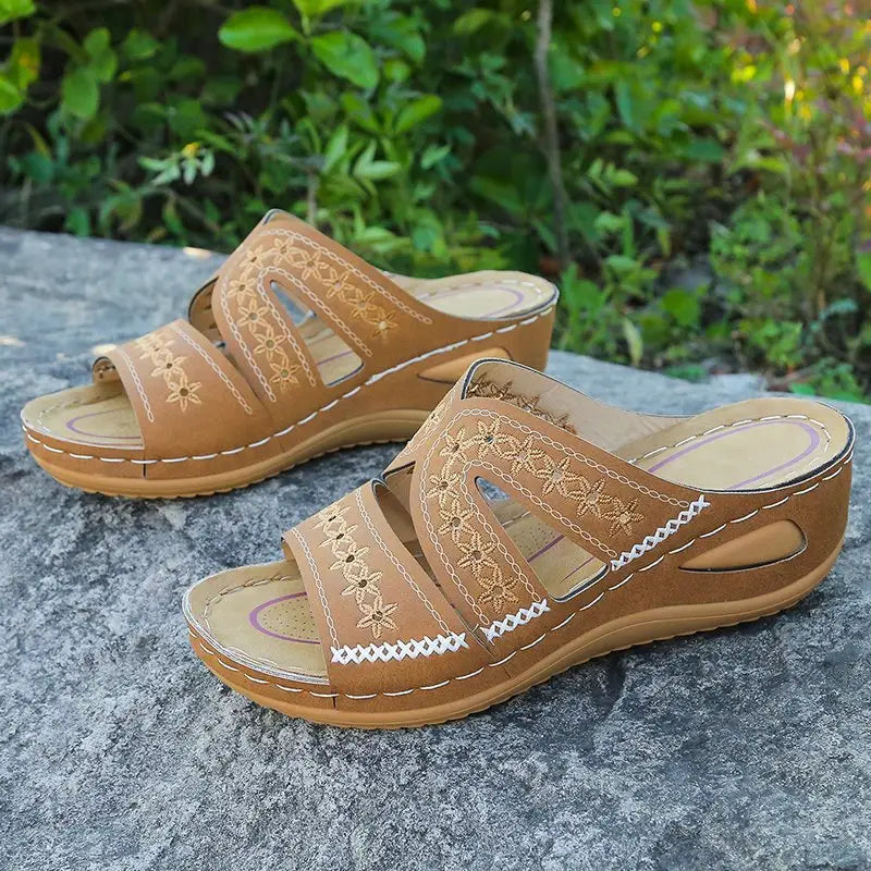 Brown floral-embroidered wedge sandals from Slip On Embroidered Sandals with quirky slip design