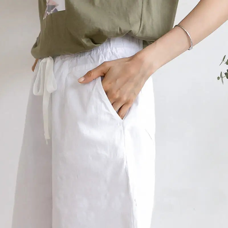 White drawstring pants.