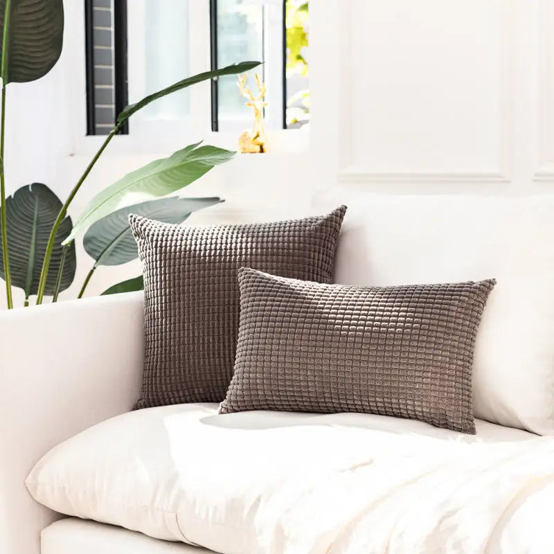 Two textured plaid corn kernel kernel square cushions for stylish home decor