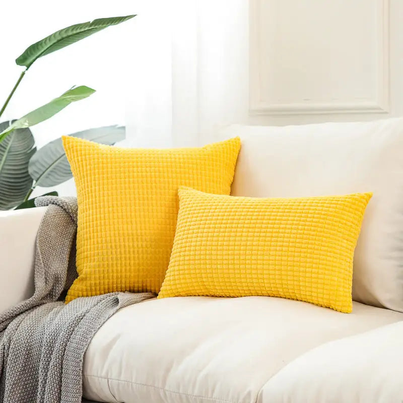 Yellow textured throw pillows featuring plaid corn kernel pattern on Soft Plaid Corn Kernel Square Cushion