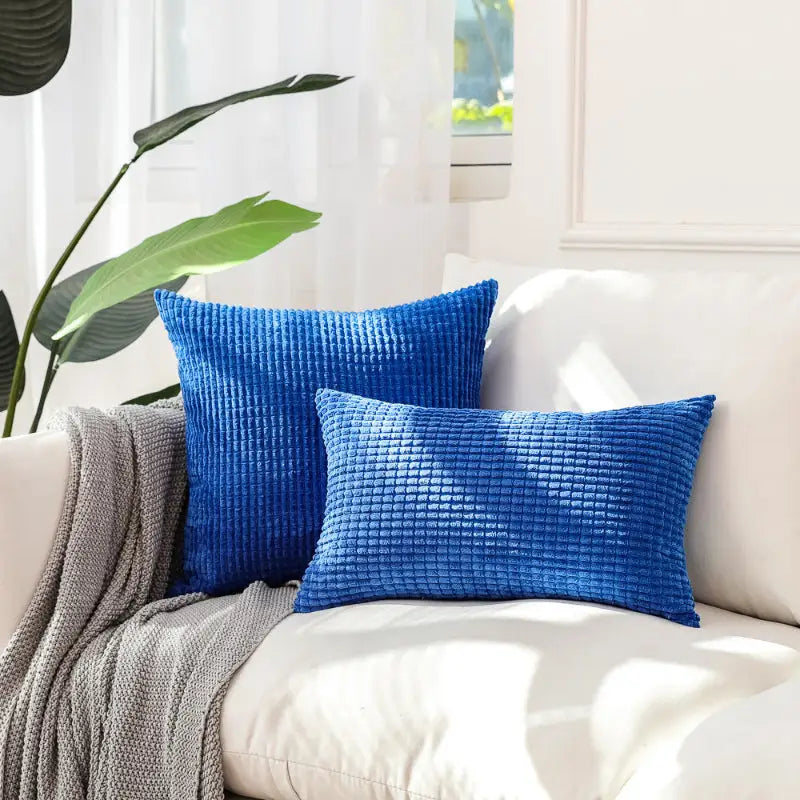 Blue corduroy throw pillows on Soft Plaid Corn Kernel Square Cushion with plaid corn kernel design