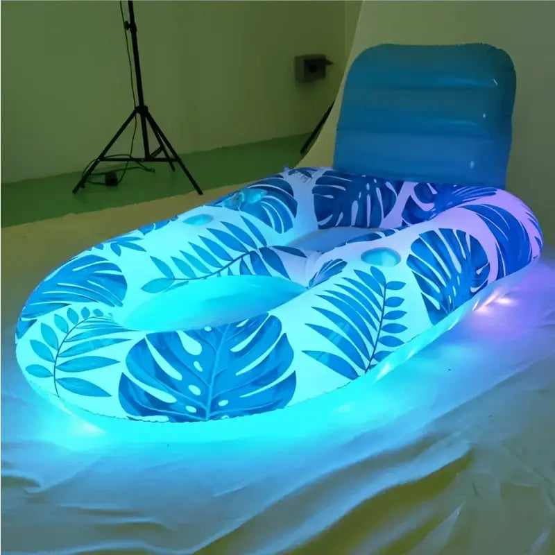 Solar Glow Inflatable Float with Blue Leaf Pattern and LED Lights for Pool Relaxation