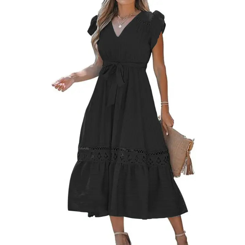 Black V-neck midi dress with tie waist.