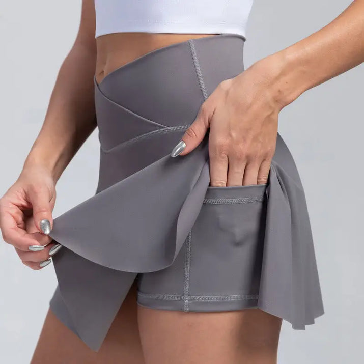Gray athletic skort with pocket.
