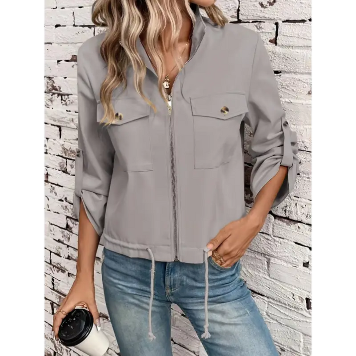 Gray zip-up jacket with pockets.