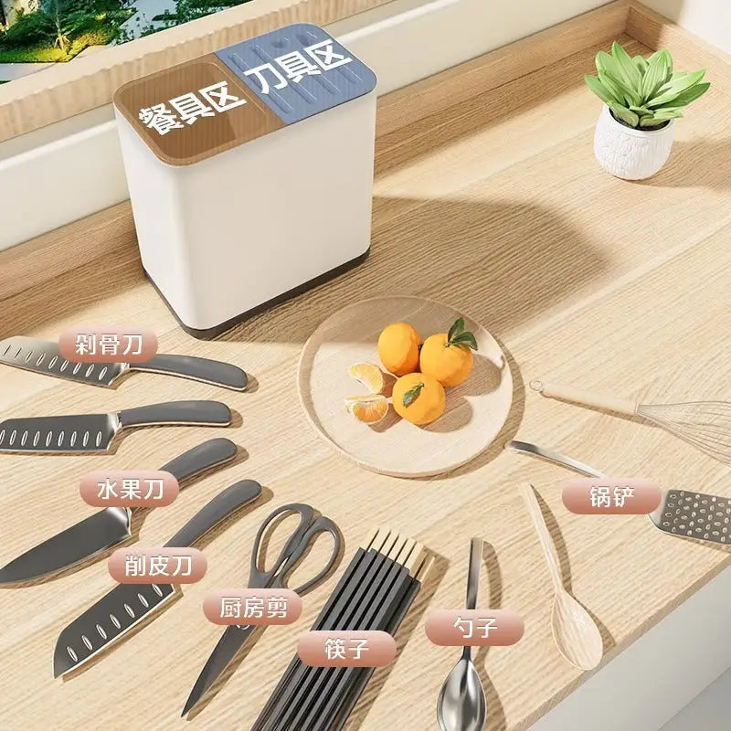 Stainless steel kitchen utensil holder with kitchen utensils and divided container setup